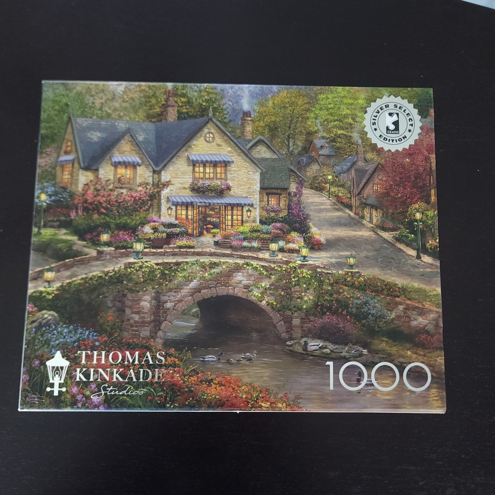 Thomas Kinkade Cottage and Stone Bridge — Yellow, green, blue- 1000 Piece Puzzle